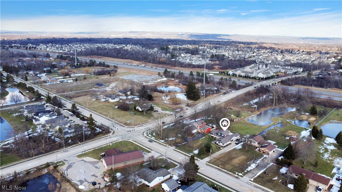563 North Carpenter Road Brunswick, OH 44212 - Photo 40 of 45 Aerial overview of property's location with nearby suburban area and a nearby body of water