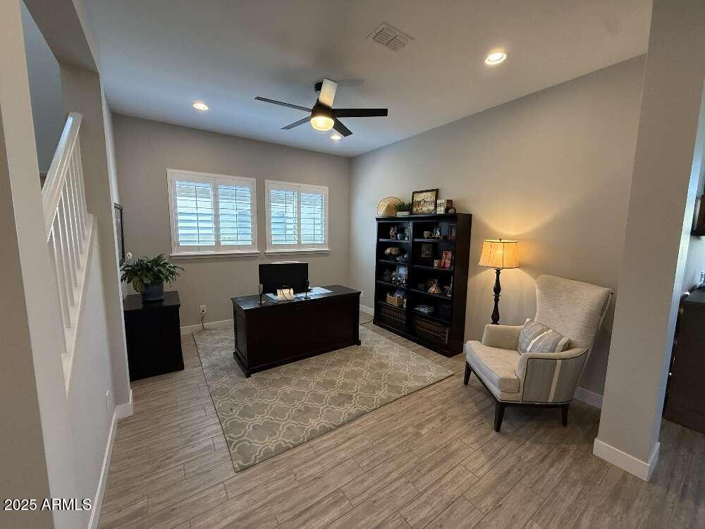 1932 West Rowel Road Phoenix, AZ 85085 - Photo 3 of 24 a living room with furniture and a large window