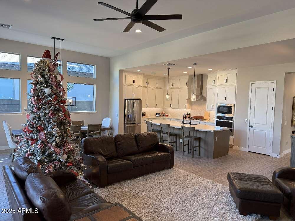 1932 West Rowel Road Phoenix, AZ 85085 - Photo 7 of 24 a living room with furniture and a large window