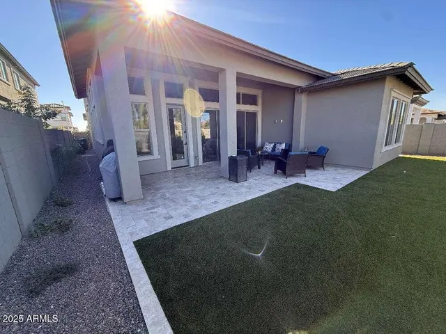 a lobby with furniture and rug