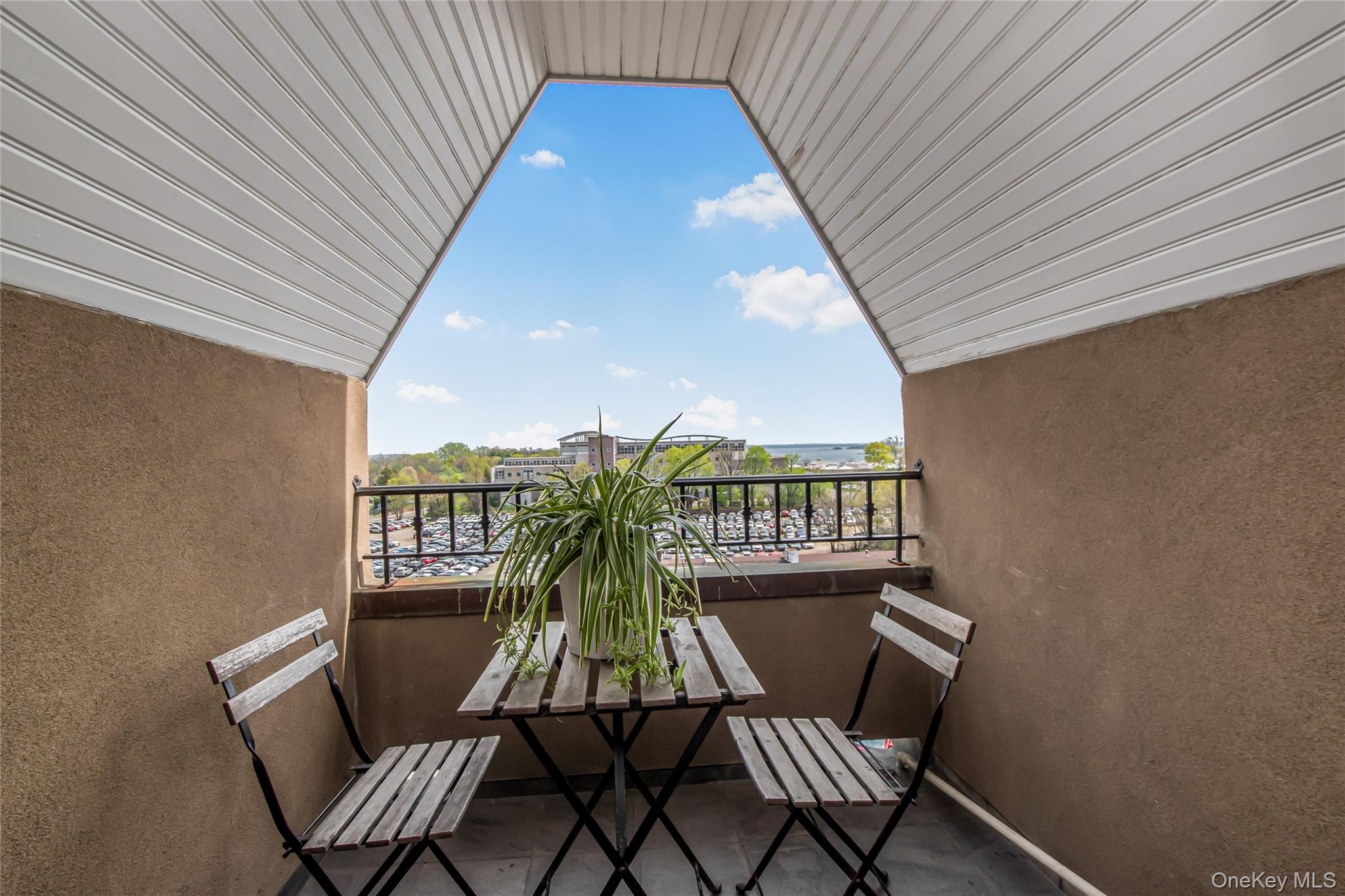 80 Old Boston Post Road, Unit 2 New Rochelle, NY 10801 - Photo 18 of 29 a view of a chairs and table in patio