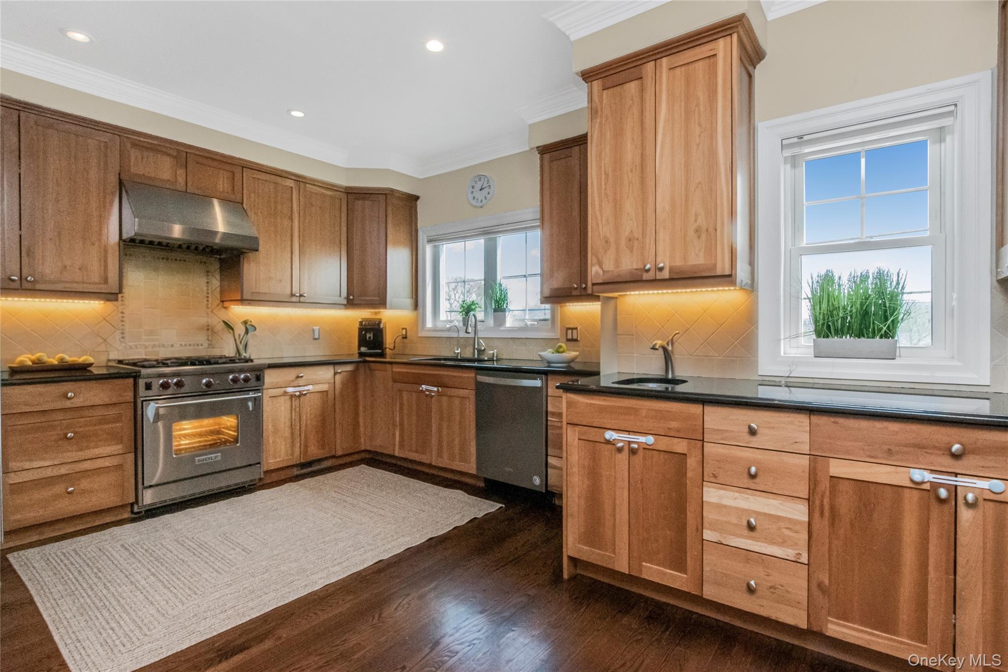 80 Old Boston Post Road, Unit 2 New Rochelle, NY 10801 - Photo 8 of 29 a kitchen with white cabinets and white appliances