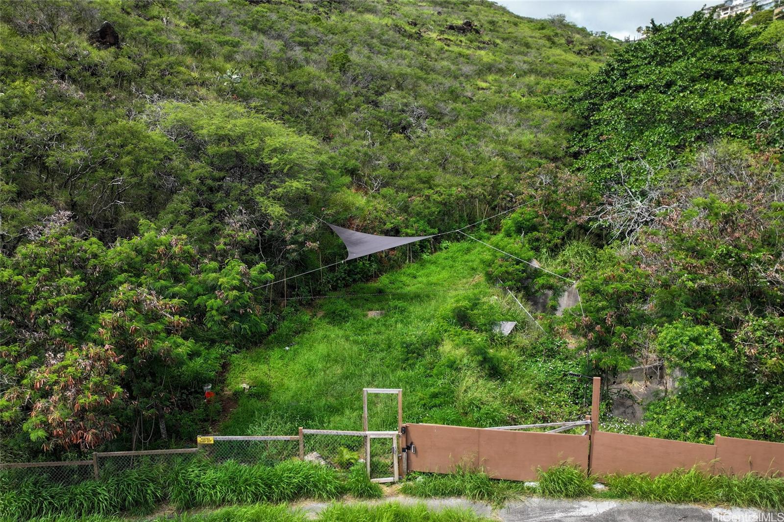 5404 Poola Street Honolulu, HI 96821 - Photo 4 of 11 a view of a backyard