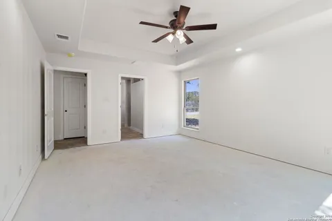 a view of a livingroom with a ceiling fan