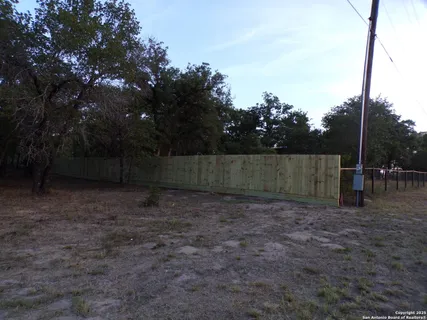 a view of outdoor space with deck and yard