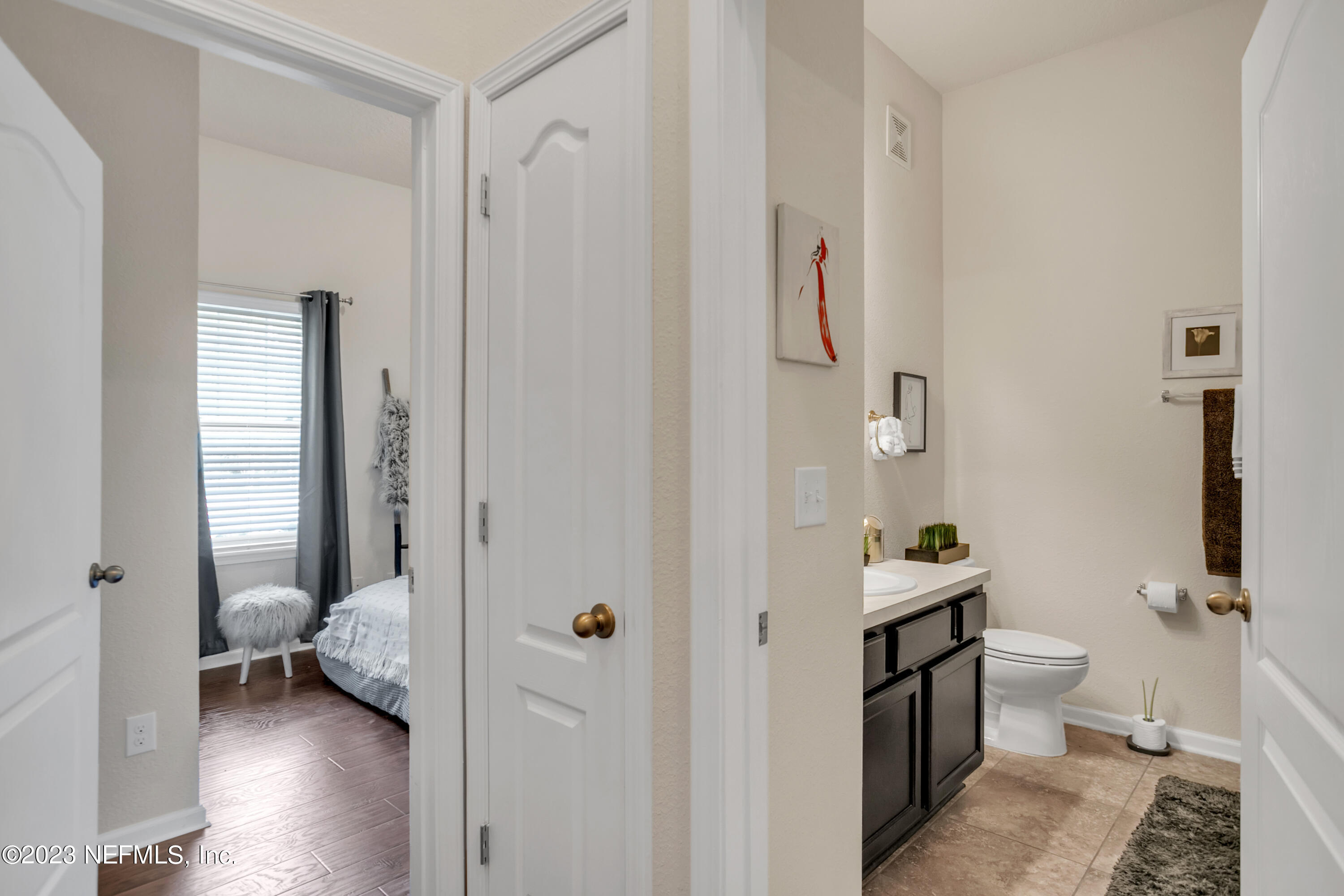 200 Larkin Place, Unit 101 St. Johns, FL 32259 - Photo 11 of 29 a bathroom with a toilet and a shower
