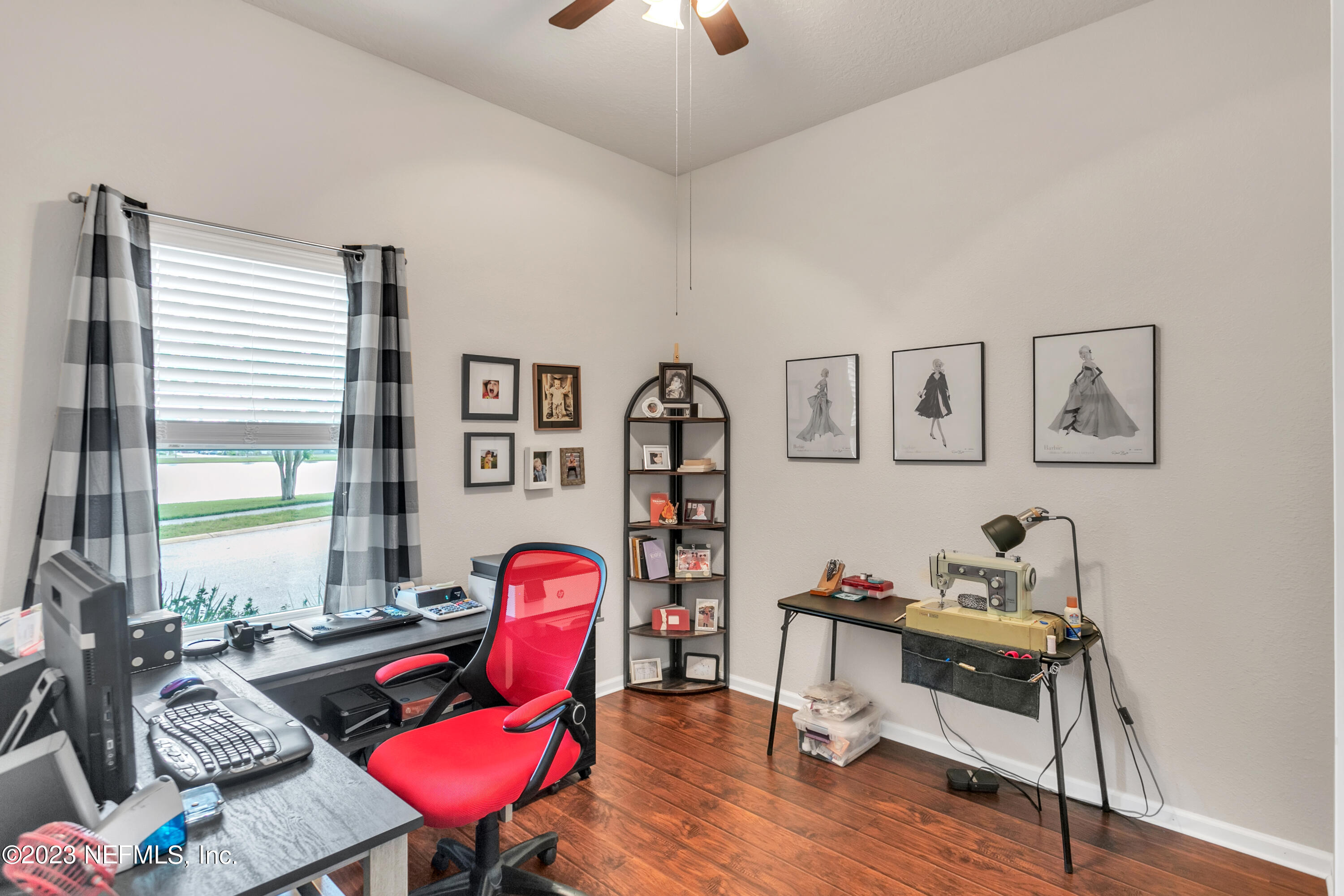 200 Larkin Place, Unit 101 St. Johns, FL 32259 - Photo 13 of 29 a living room with furniture and a wooden floor