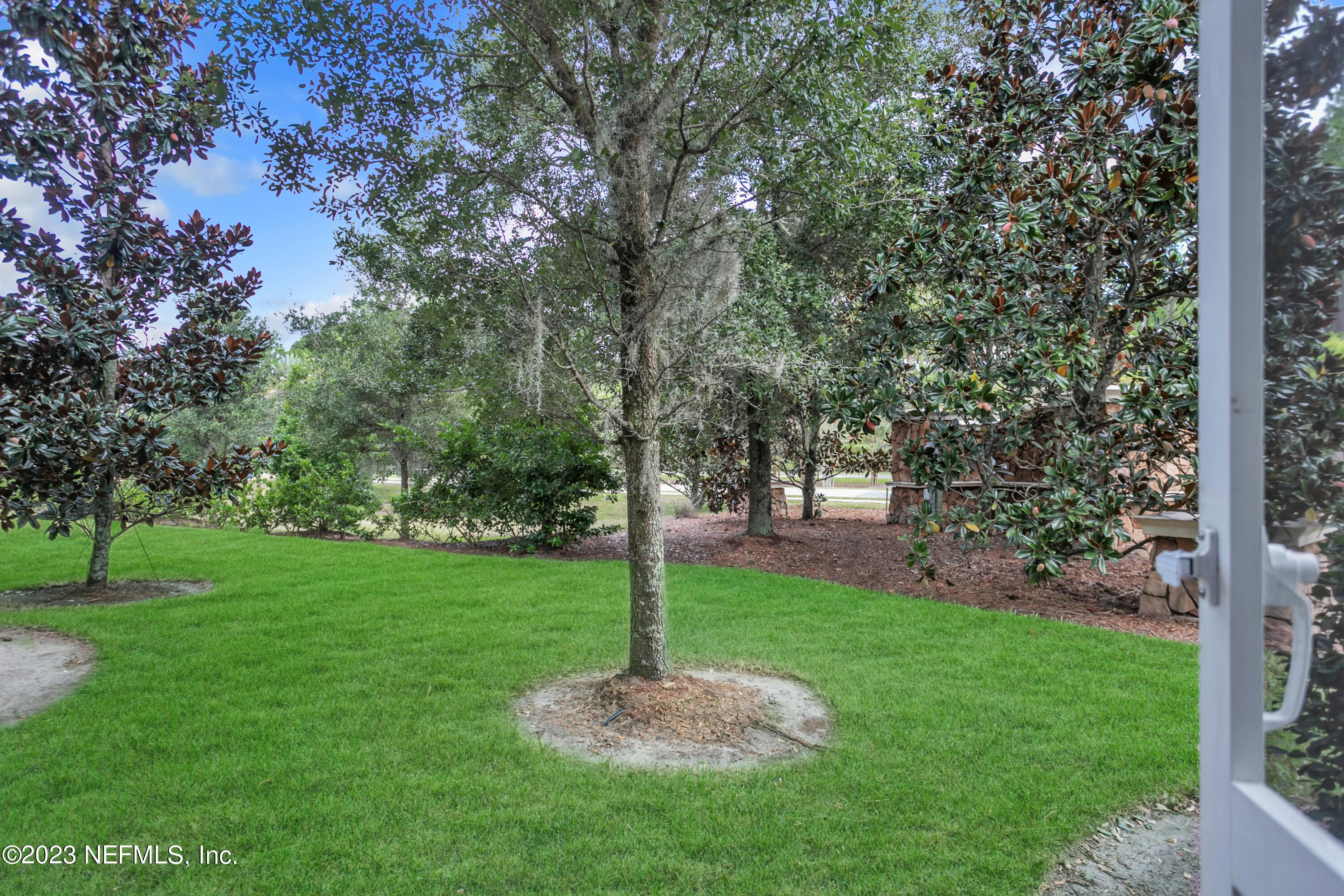 200 Larkin Place, Unit 101 St. Johns, FL 32259 - Photo 16 of 29 a garden with trees