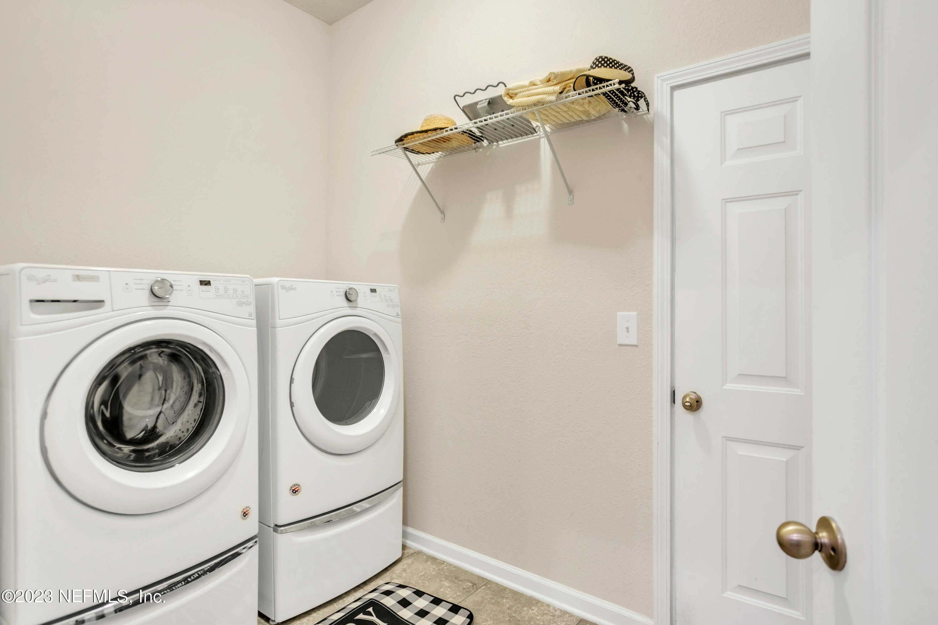 200 Larkin Place, Unit 101 St. Johns, FL 32259 - Photo 19 of 29 a utility room with dryer and washer