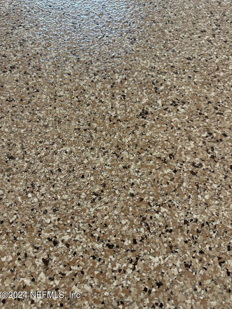 200 Larkin Place, Unit 101 St. Johns, FL 32259 - Photo 27 of 29 a bathroom with a shower curtain