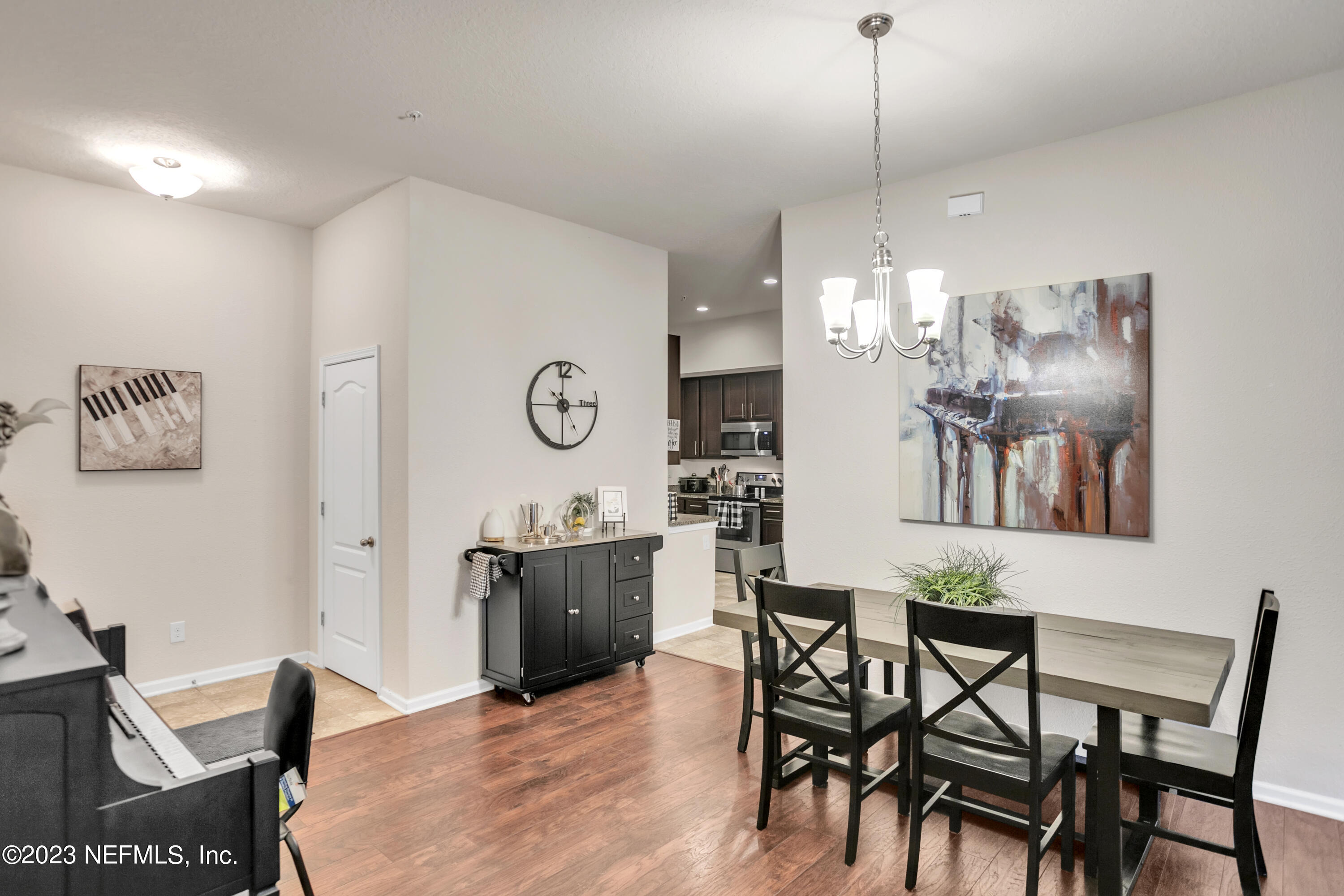 200 Larkin Place, Unit 101 St. Johns, FL 32259 - Photo 3 of 29 a view of a dining room with furniture