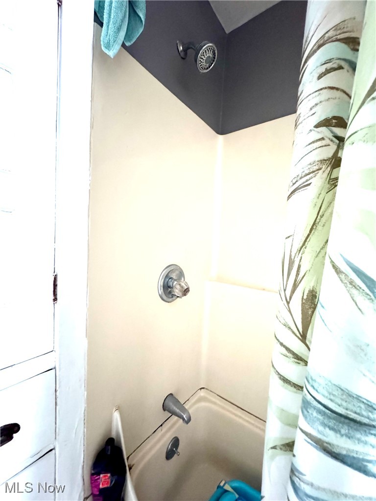 2152 Middlefield Road Cleveland, OH 44106 - Photo 34 of 50 Bathroom with shower / bath combination with curtain