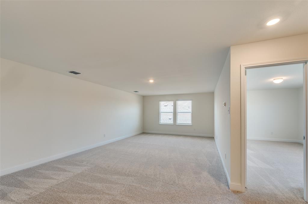 341 Fallbrook Drive Aledo, TX 76008 - Photo 19 of 40 Spare room featuring light colored carpet and recessed lighting