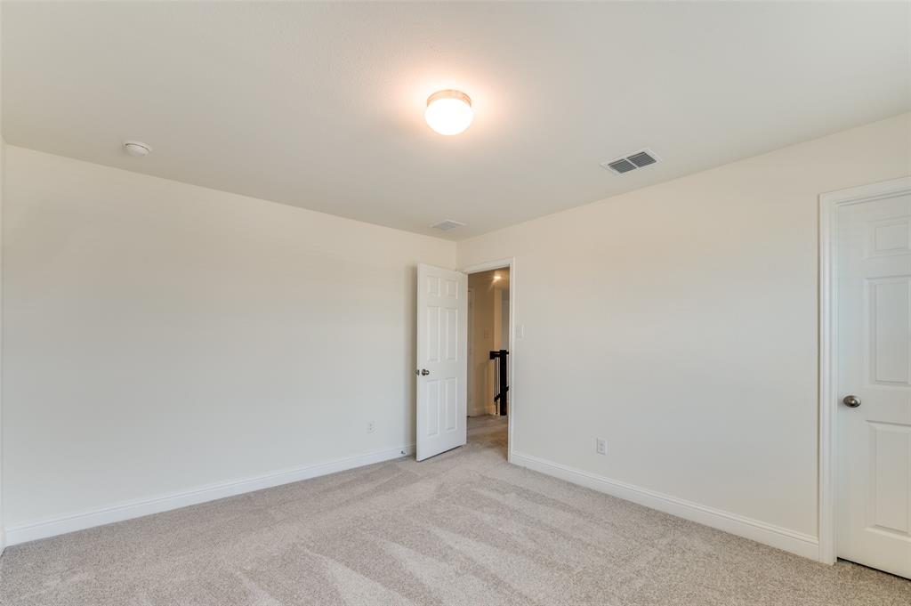 341 Fallbrook Drive Aledo, TX 76008 - Photo 20 of 40 Unfurnished room featuring light colored carpet and baseboards