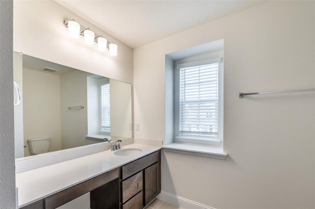 341 Fallbrook Drive Aledo, TX 76008 - Photo 22 of 40 Bathroom featuring vanity and toilet