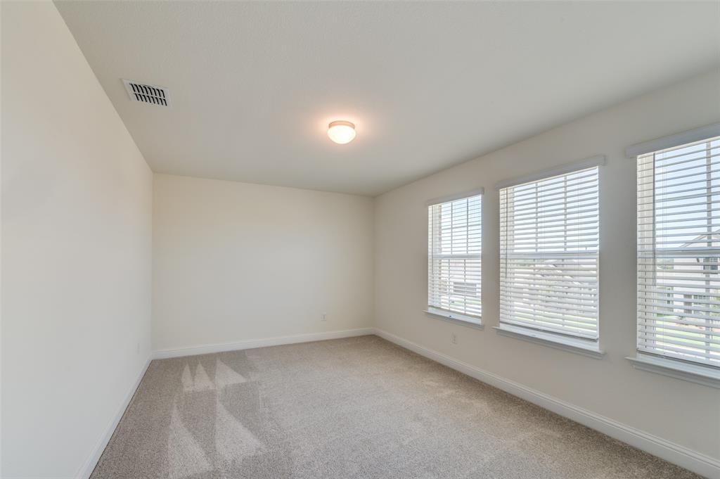 341 Fallbrook Drive Aledo, TX 76008 - Photo 23 of 40 Empty room featuring light colored carpet and baseboards
