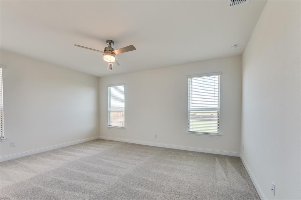 341 Fallbrook Drive Aledo, TX 76008 - Photo 24 of 40 Unfurnished room featuring light carpet and a ceiling fan