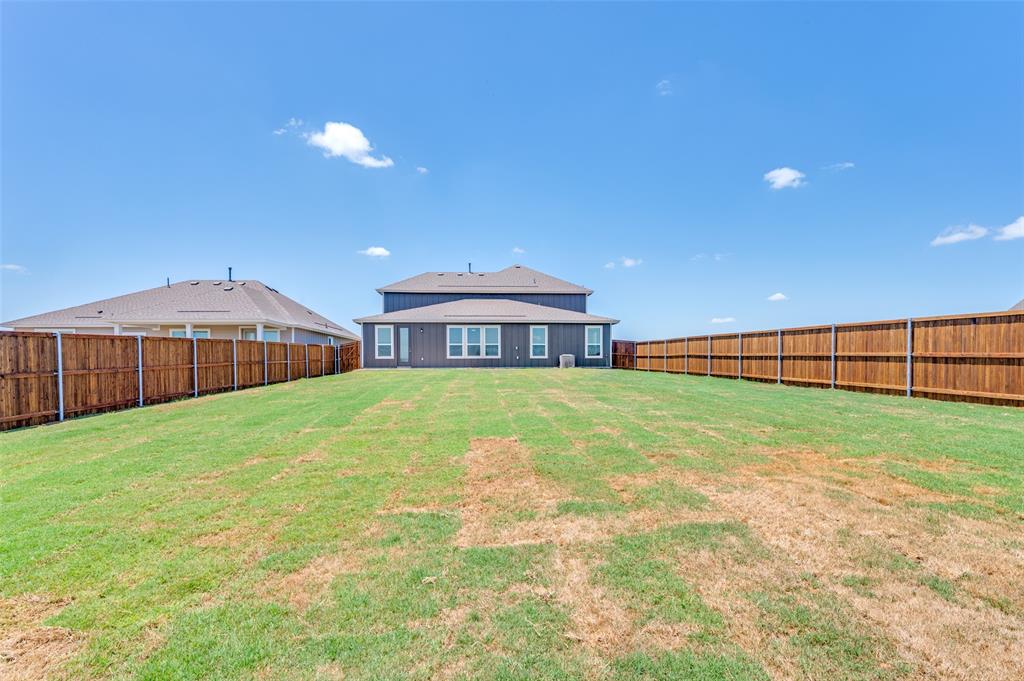 341 Fallbrook Drive Aledo, TX 76008 - Photo 26 of 40 Back of property featuring a fenced backyard