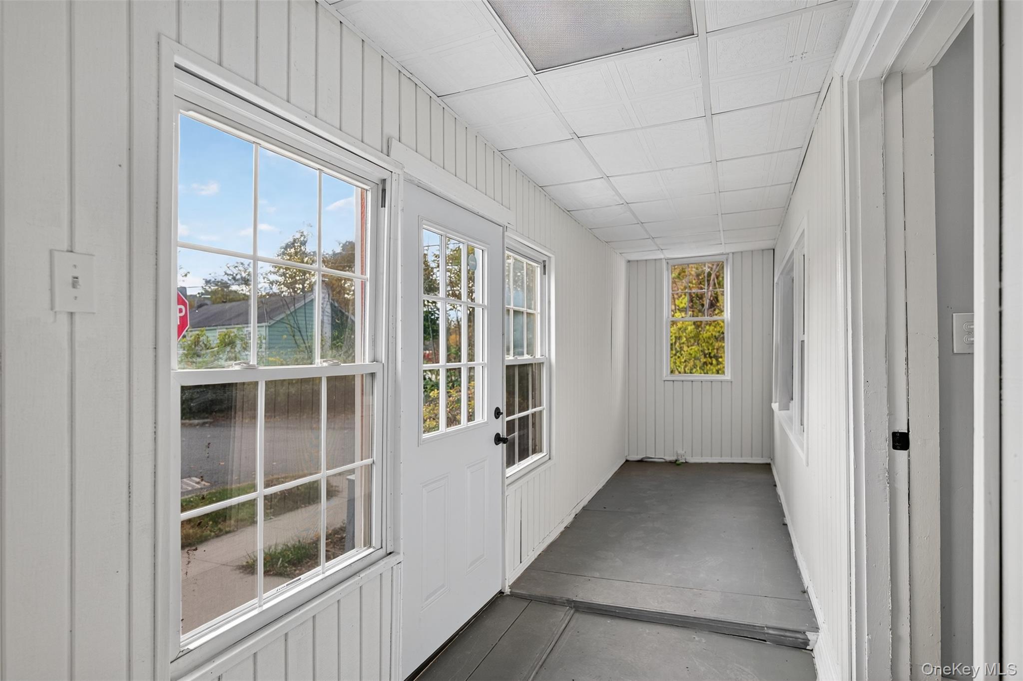 95 Market Street Wappingers Falls, NY 12590 - Photo 3 of 15 a view of empty room with windows