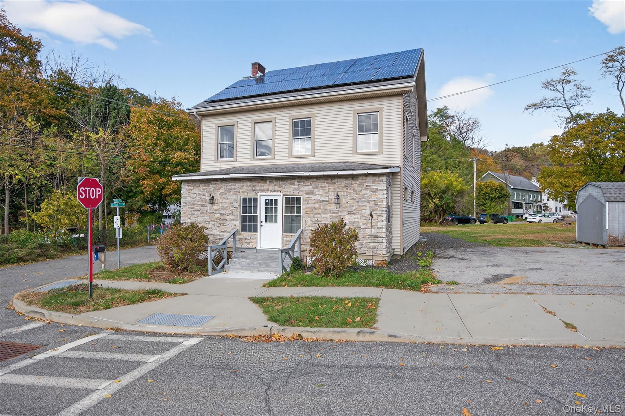 95 Market Street Wappingers Falls, NY 12590 - Photo 4 of 15 a front view of a house with a yard and garage
