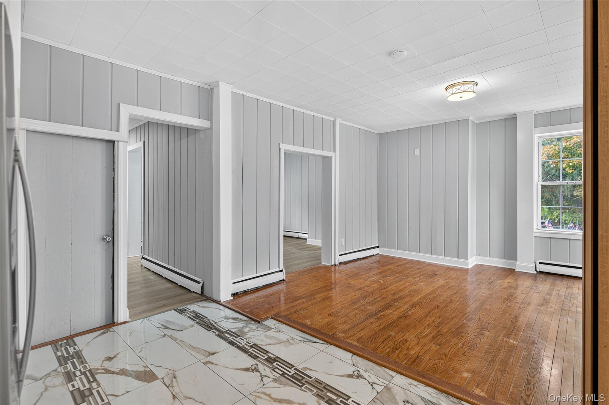 95 Market Street Wappingers Falls, NY 12590 - Photo 7 of 15 a bedroom with a bed and a window