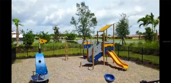 a view of park with a slide