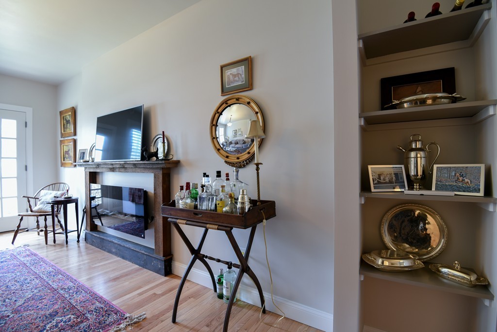 32 North Prospect Street, Unit 4 Amherst, MA 01002 - Photo 11 of 29 a view of a livingroom with furniture and workspace