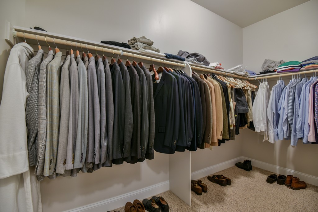 32 North Prospect Street, Unit 4 Amherst, MA 01002 - Photo 19 of 29 a view of walk in closet with clothes and shoes