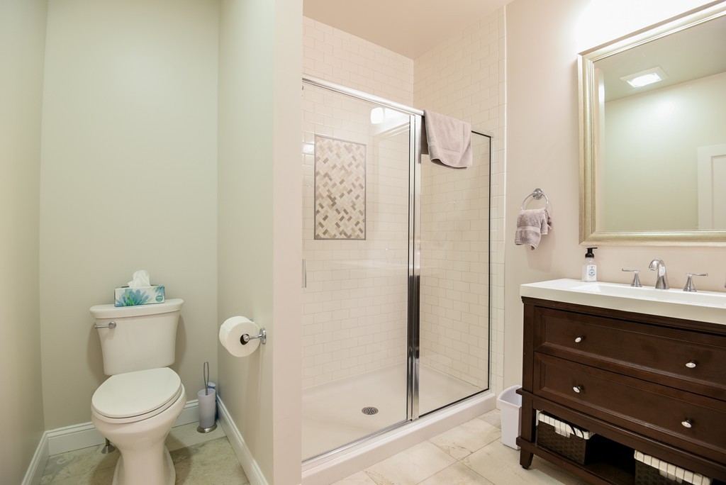 32 North Prospect Street, Unit 4 Amherst, MA 01002 - Photo 20 of 29 a bathroom with a toilet sink and shower