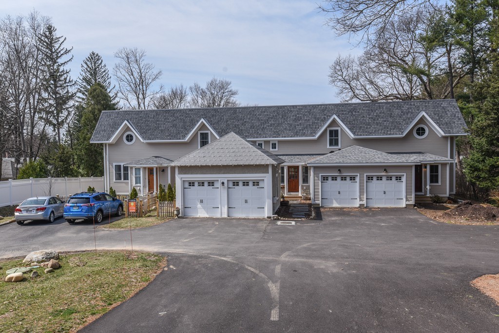 32 North Prospect Street, Unit 4 Amherst, MA 01002 - Photo 2 of 29 front view of a house with a patio