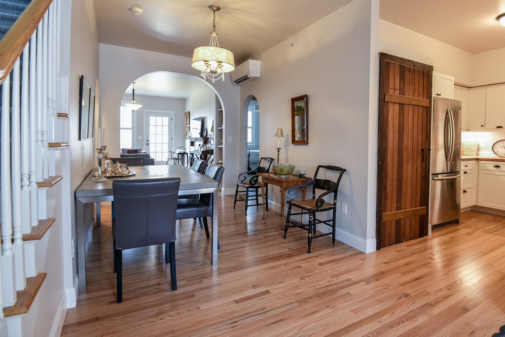 32 North Prospect Street, Unit 4 Amherst, MA 01002 - Photo 25 of 29 a view of a dining room with furniture and wooden floor