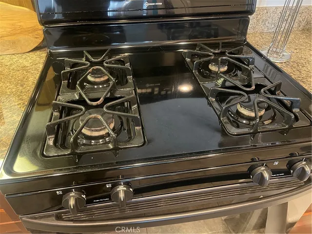 a view of a balcony with furniture