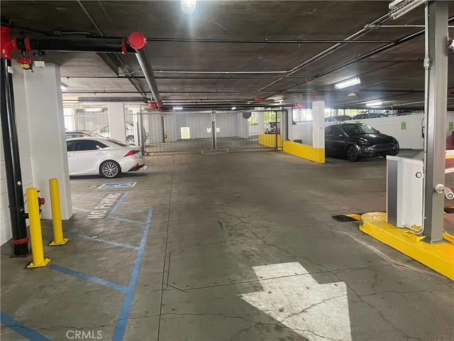 a kitchen with a sink and a stove top oven
