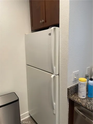 a view of an empty room with microwave