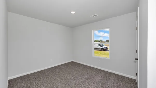 an empty room with a window