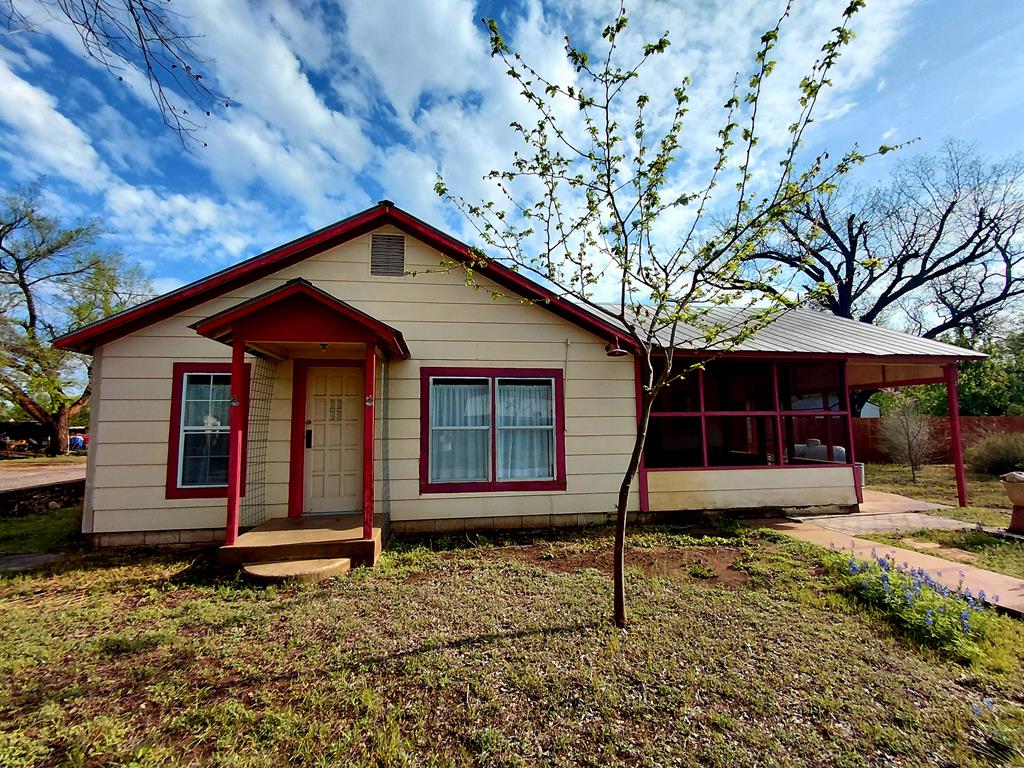631 Millard Street Mason, TX 76856 - Photo 17 of 20 a front view of a house with garden
