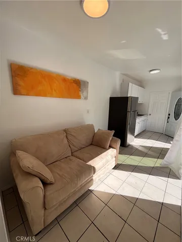 a living room with a couch and a coffee table