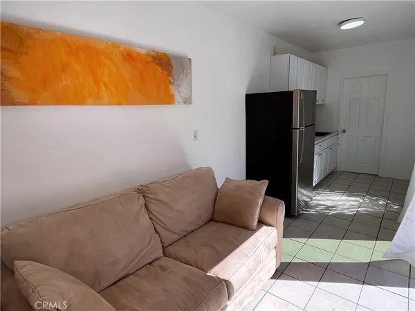 a living room with a couch and a coffee table