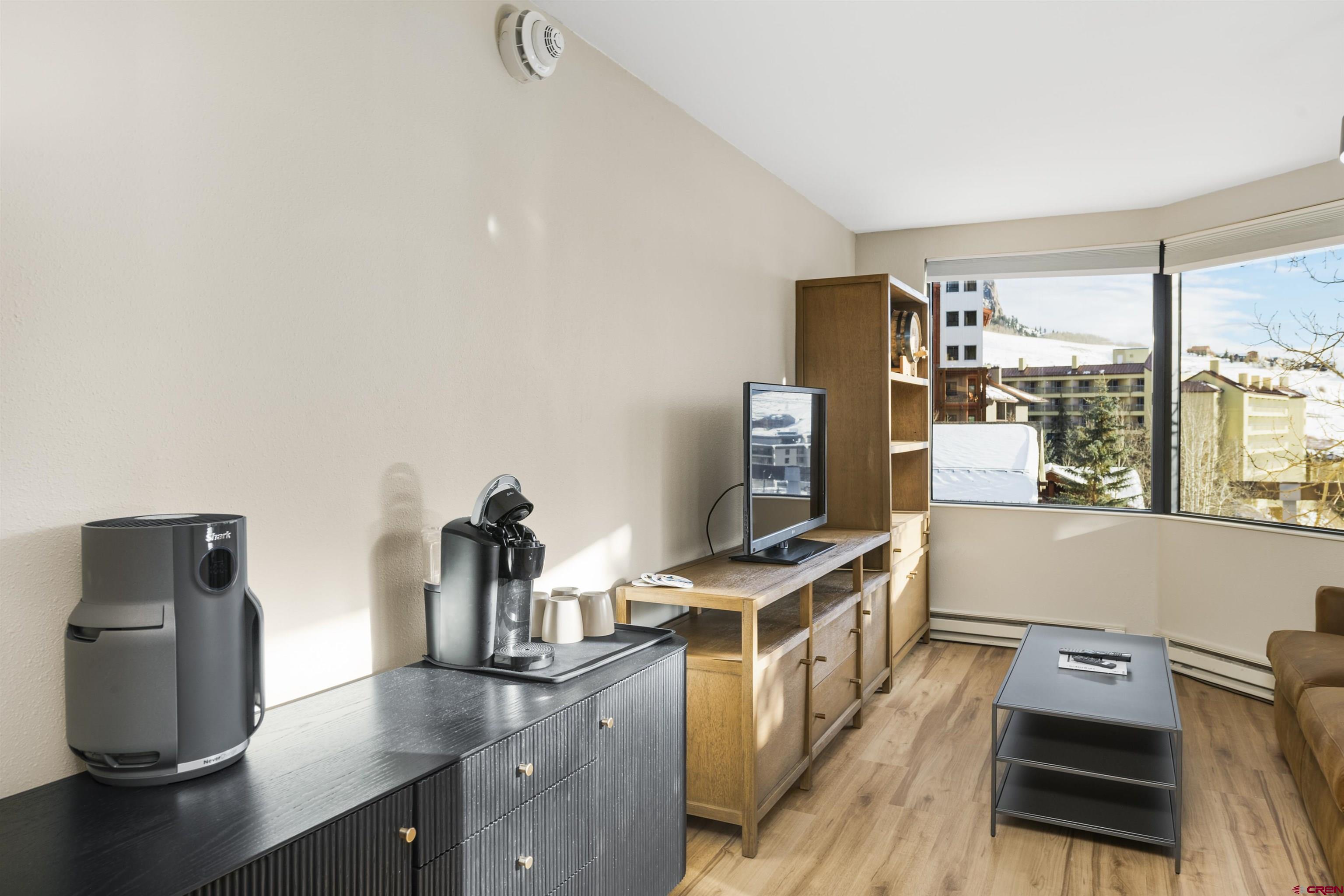 6 Emmons Road, Unit 351 Crested Butte, CO 81225 - Photo 11 of 21 a view of a workspace with furniture and a window