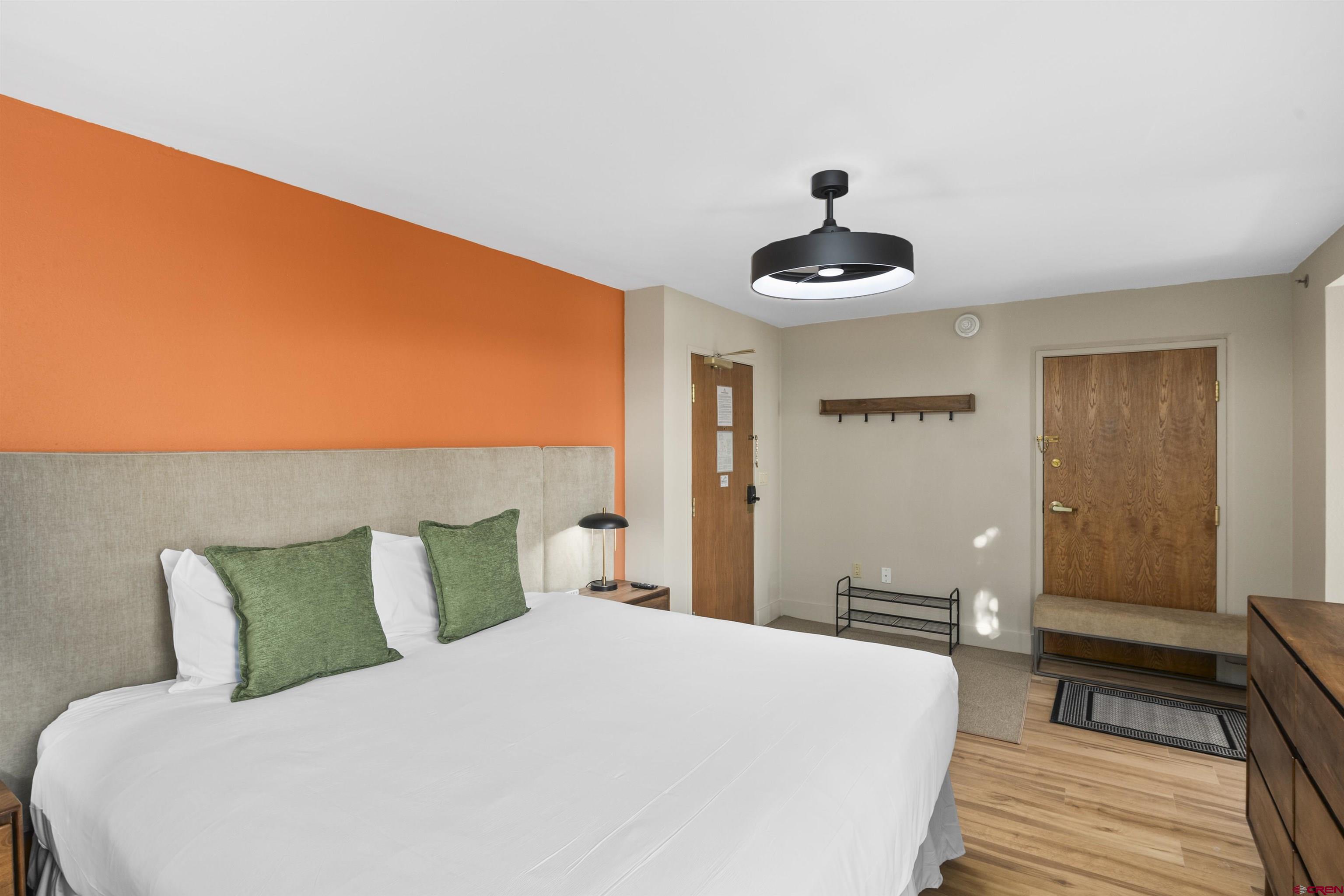 6 Emmons Road, Unit 351 Crested Butte, CO 81225 - Photo 13 of 21 a bedroom with a bed and a potted plant