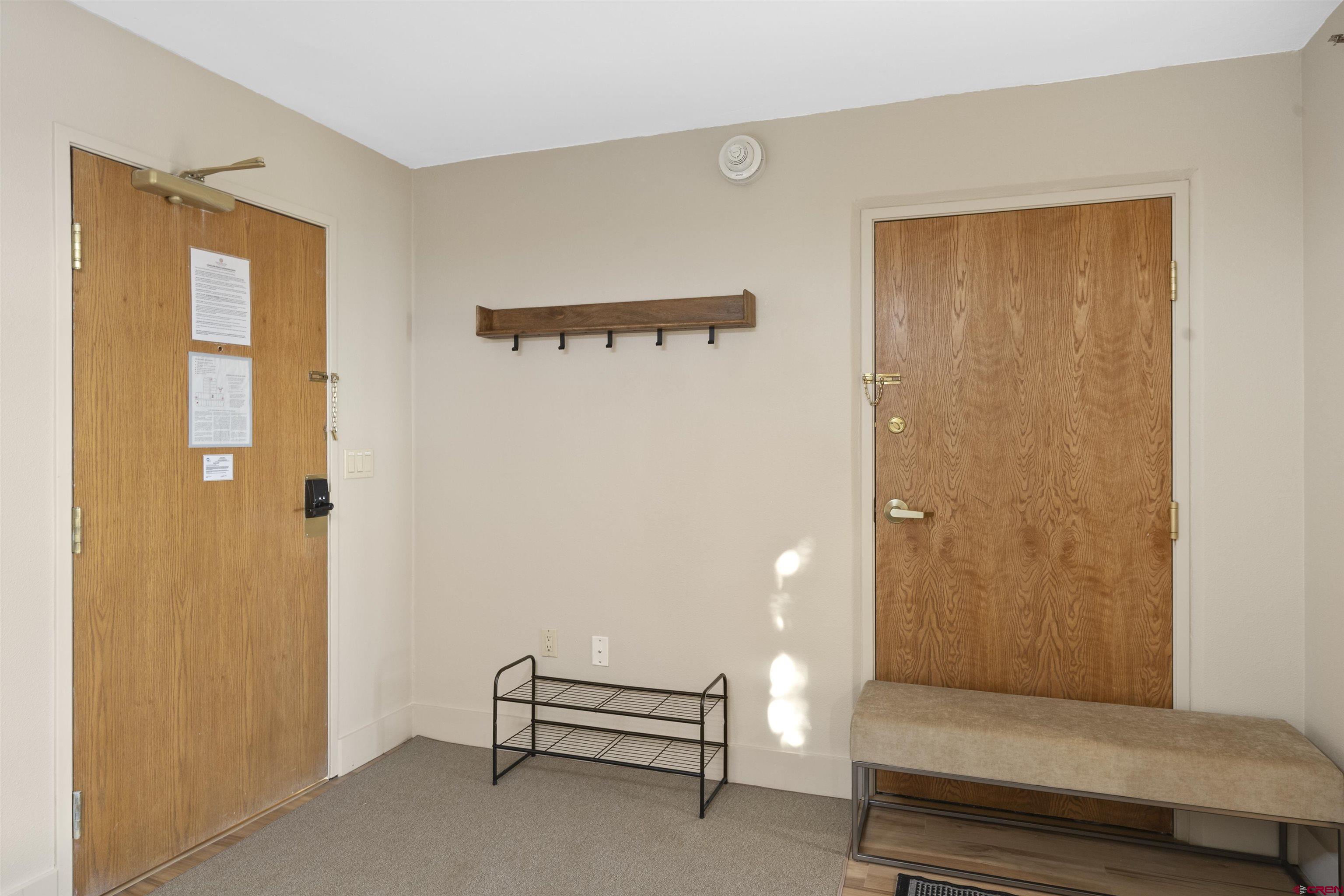 6 Emmons Road, Unit 351 Crested Butte, CO 81225 - Photo 19 of 21 a living room with furniture and a window