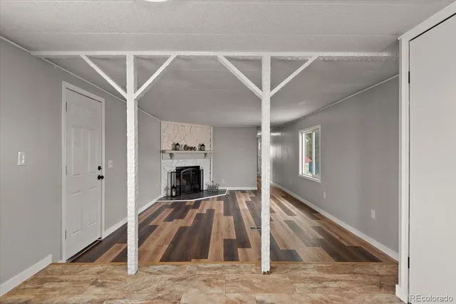 a view of a livingroom with a fireplace