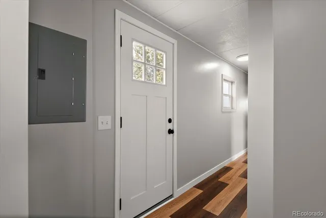 a view of room with window and hallway