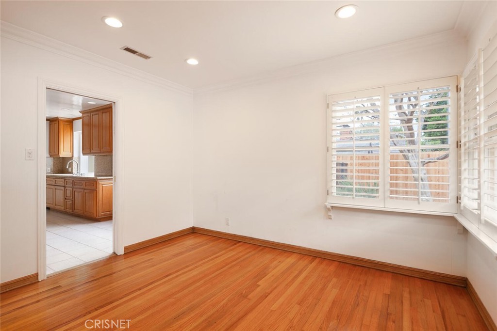 3734 Wrightwood Drive Studio City, CA 91604 - Photo 11 of 28 a view of a room with wooden floor and a sink