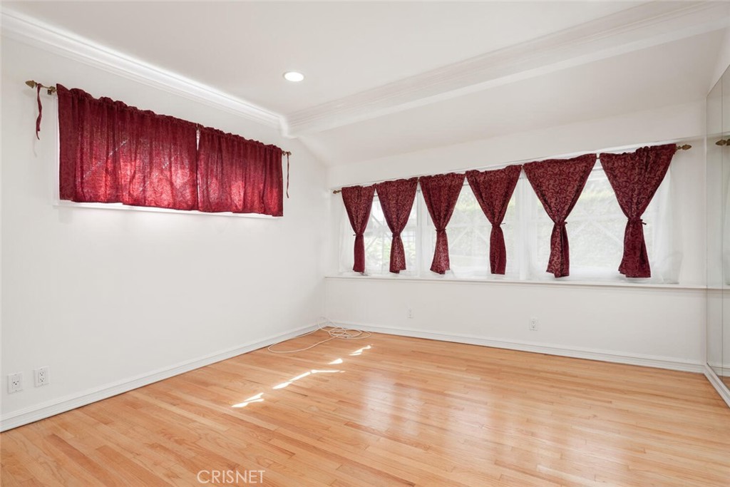 3734 Wrightwood Drive Studio City, CA 91604 - Photo 16 of 28 a view of an empty room with wooden floor and a wooden floor