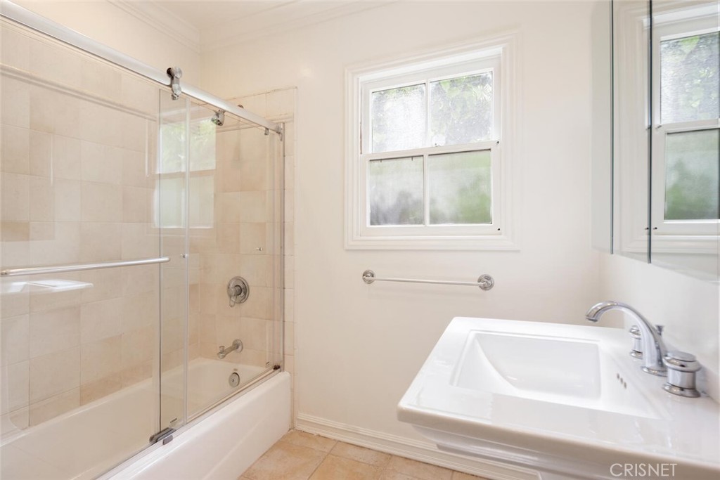 3734 Wrightwood Drive Studio City, CA 91604 - Photo 18 of 28 a bathroom with a tub shower vanity and a sink