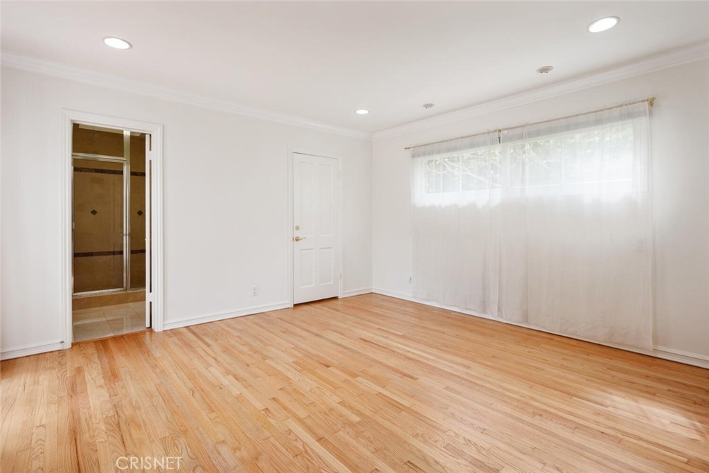 3734 Wrightwood Drive Studio City, CA 91604 - Photo 19 of 28 a view of empty room with wooden floor
