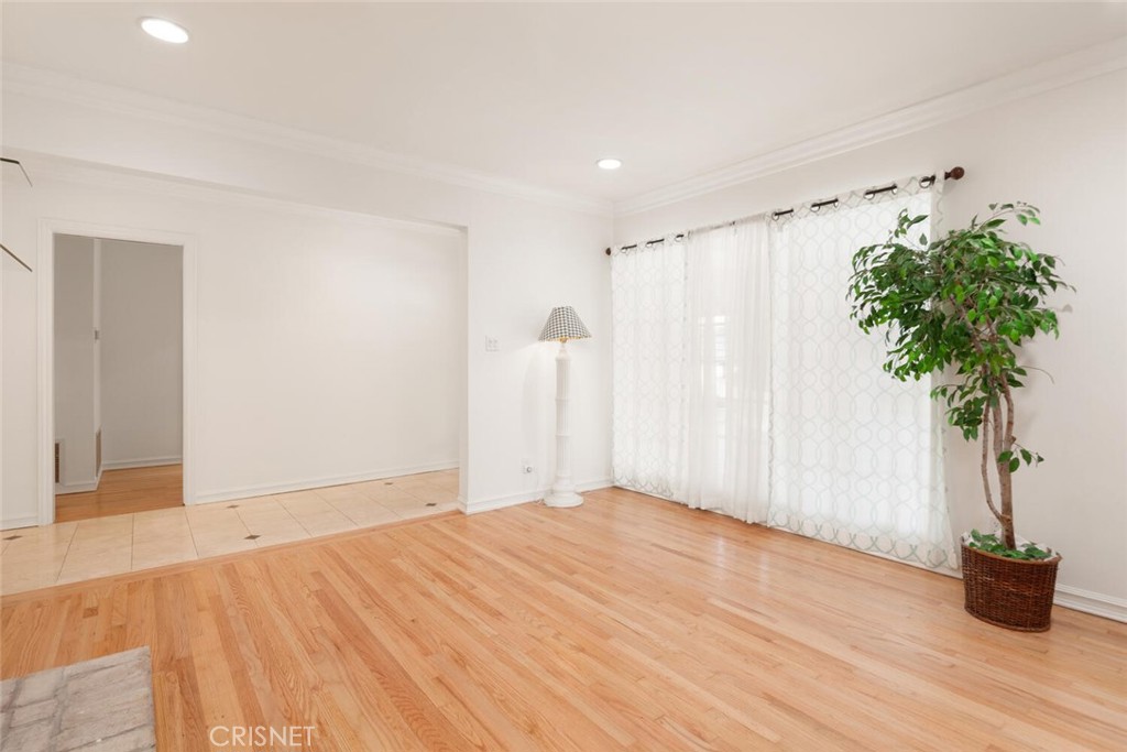 3734 Wrightwood Drive Studio City, CA 91604 - Photo 2 of 28 a view of empty room with wooden floor and potted plant