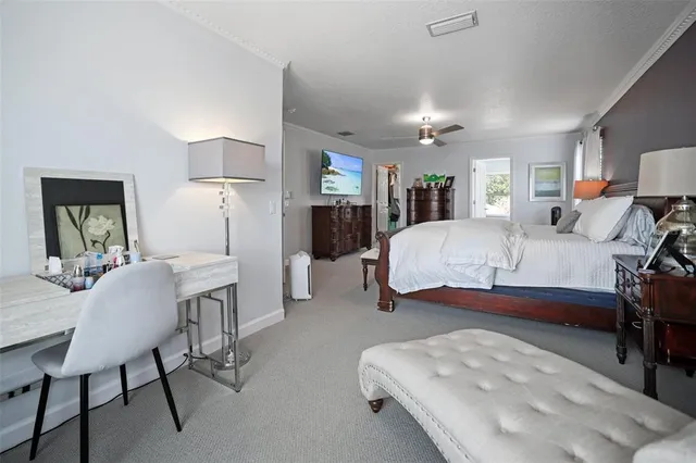 a bathroom with a sink mirror and toilet