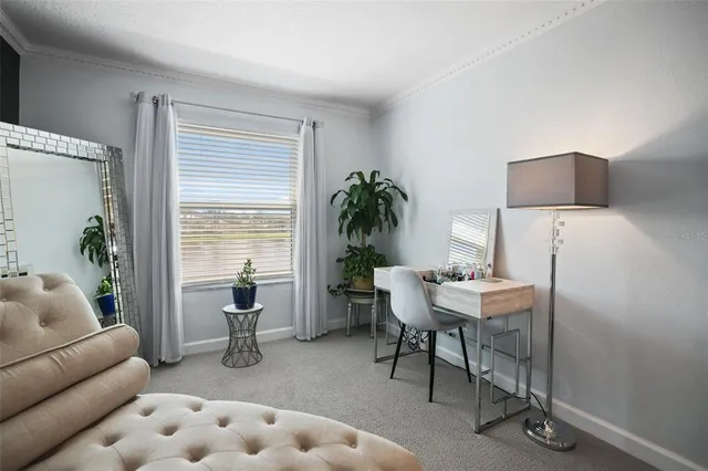 a bed room with a bed and a night stand